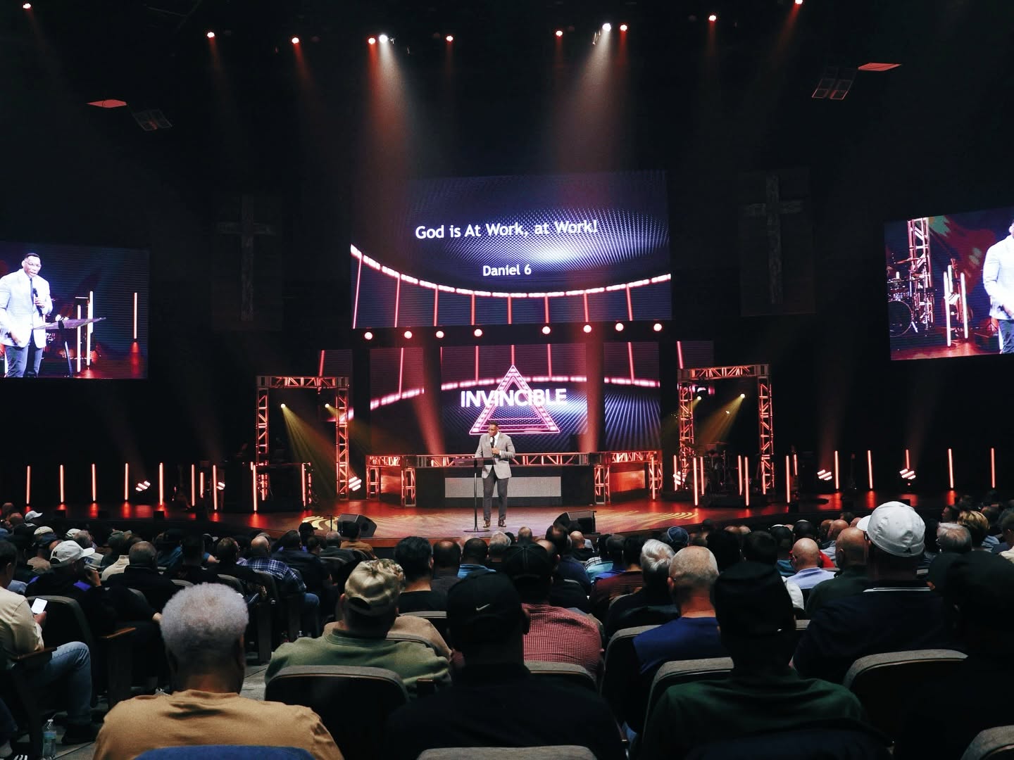 Men listening to a message in the Brightmoor auditorium at Invincible 2026
